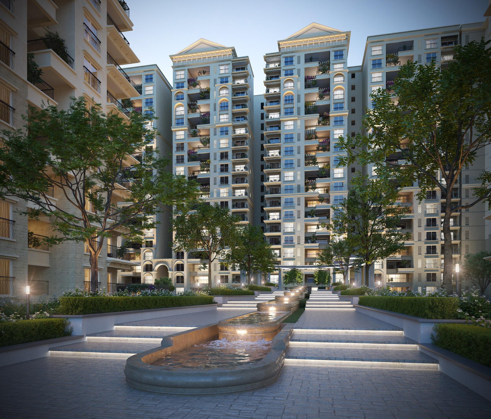 Exterior view of Embassy Lake Terraces showing modern architecture with lush greenery and towers